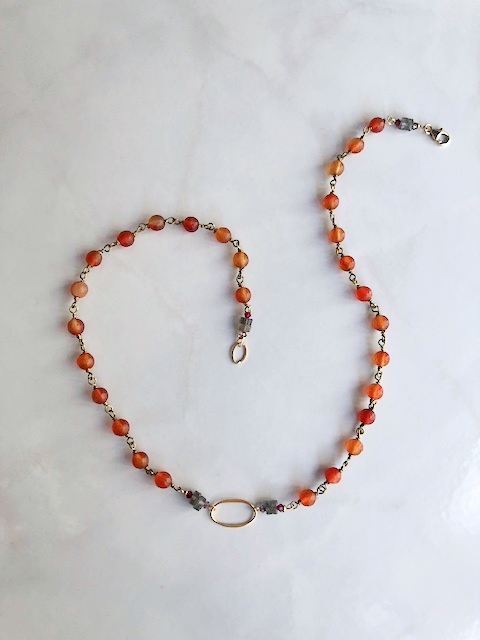 A Brushed Gold Oval, Carnelian, Labradorite Chain Necklace